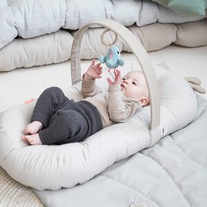 Done by Deer cozy lounger with activity arch Raffi Sand - Easygrow